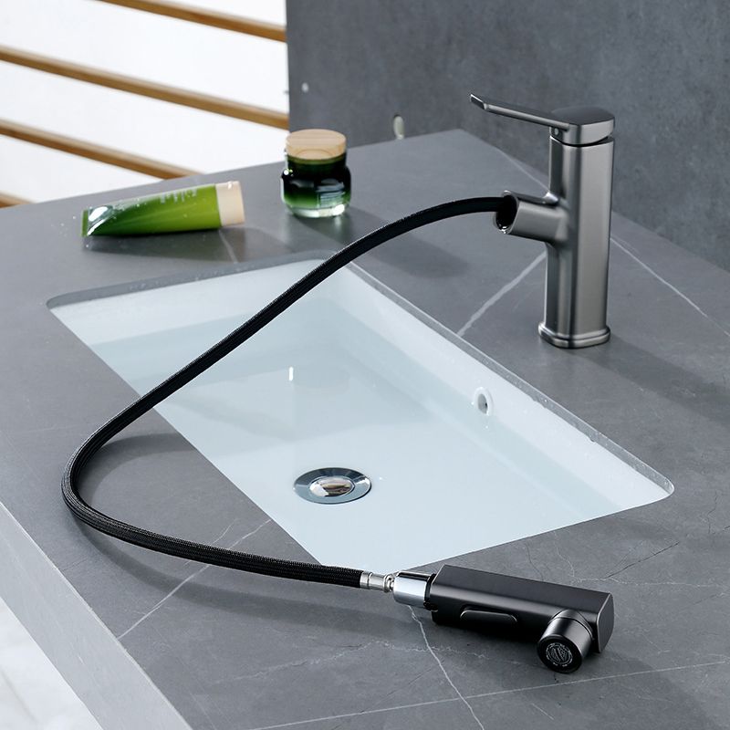 BowLift | Modern bathroom sink faucet with brass lever handles and swivel spout