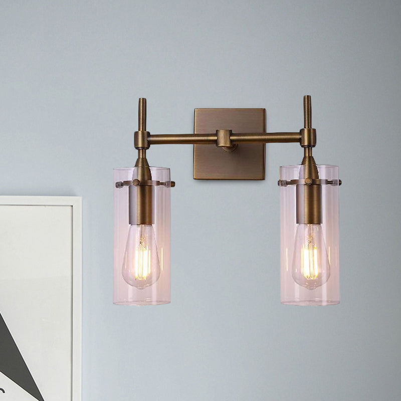 BowLift | Clear Glass Cylinder Wall Lantern Modern 2 Lights Dining Room Lighting Fixture in Patina Brass
