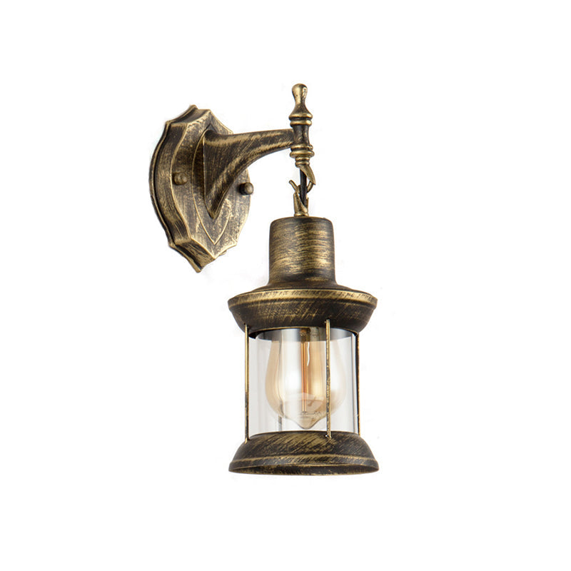 BowLift | An E27 wall light with a petroleum shade made of clear glass Traditional outdoor wall light in antique bronze