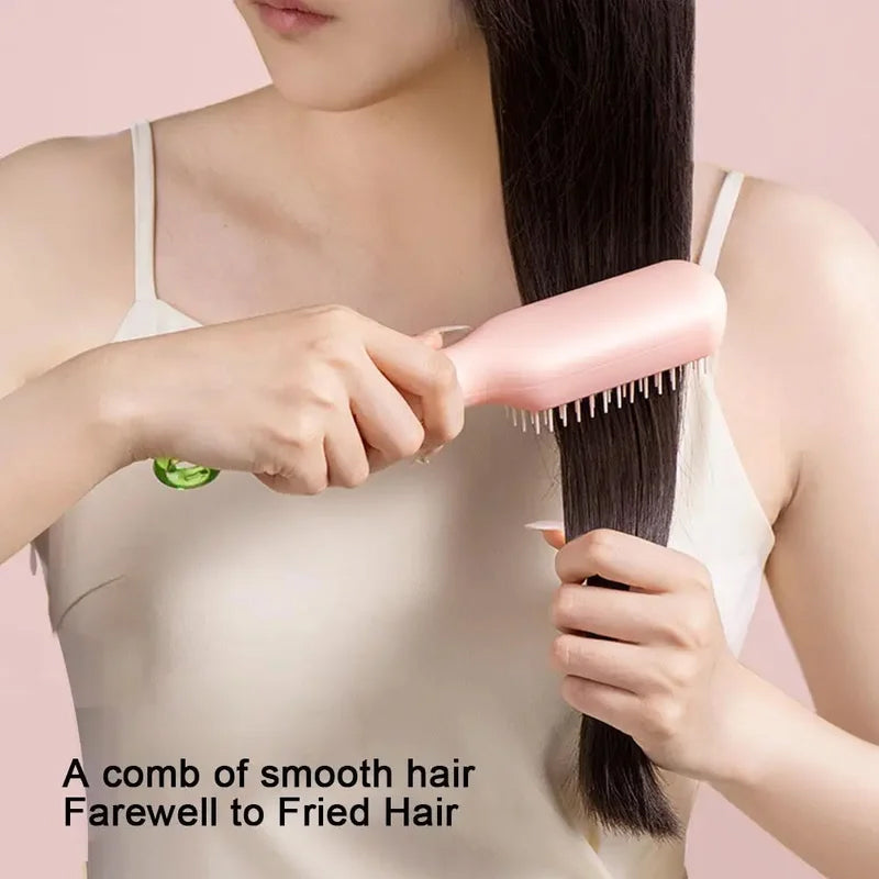 BowLift | Self-cleaning anti-static massage comb