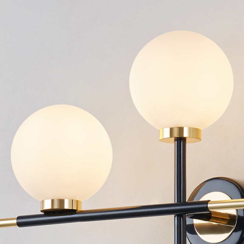 BowLift | Milk glass orb wall light with cross design 2 lights modern black and brass wall light
