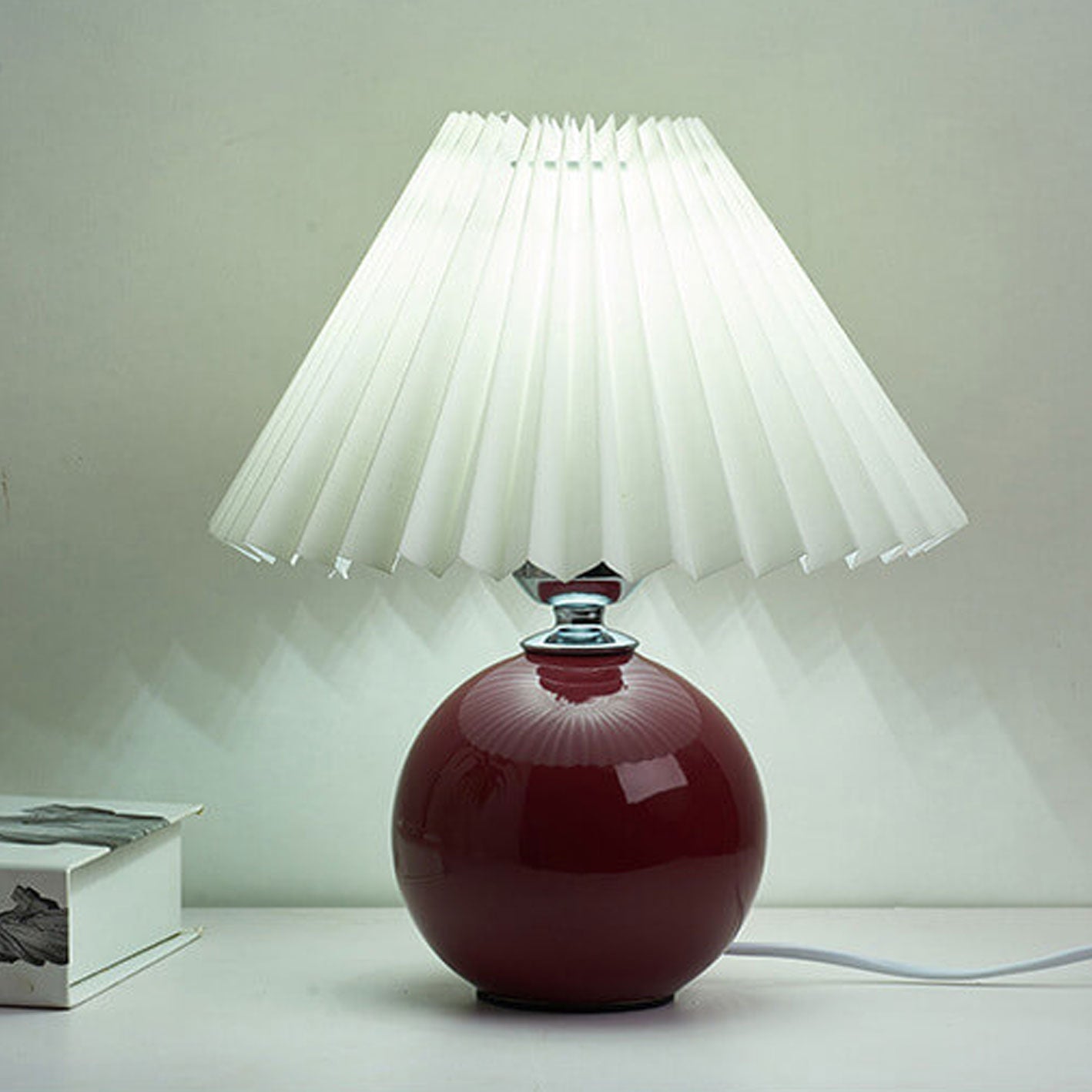 BowLift | Nordic minimalist 1-light table lamp made of ceramic with pleats
