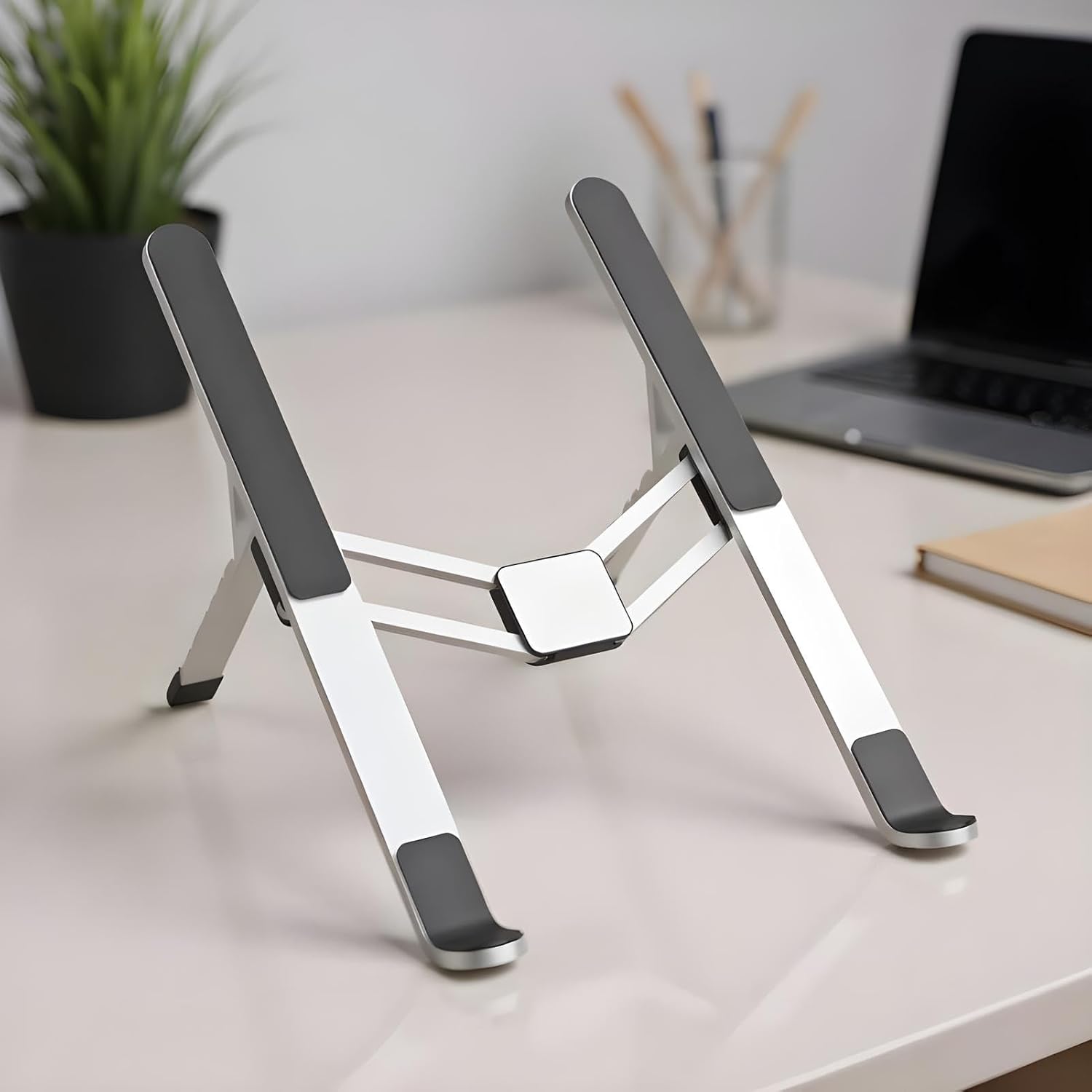 BowLift | Adjustable Laptop Stand – Foldable Cooling Notebook Mount for Office & Travel – Orvane