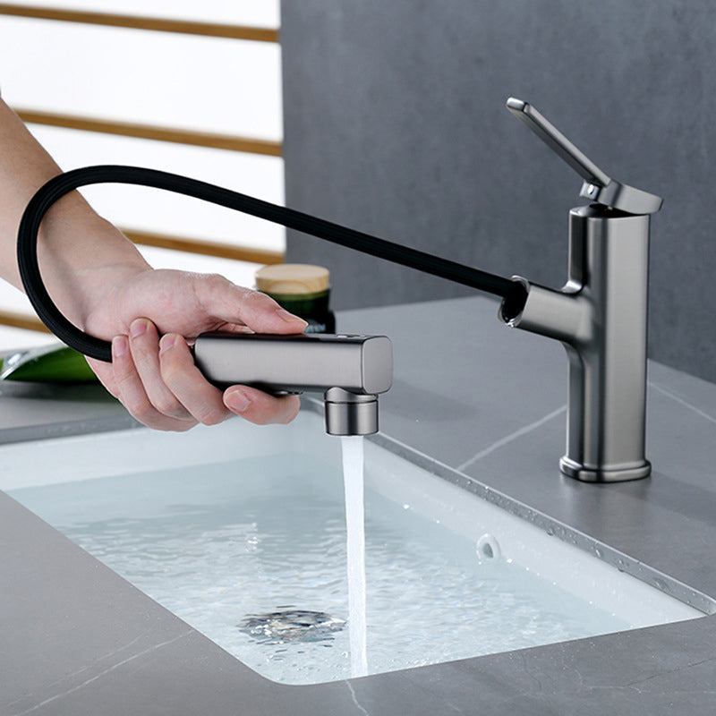 BowLift | Modern bathroom sink faucet with brass lever handles and swivel spout