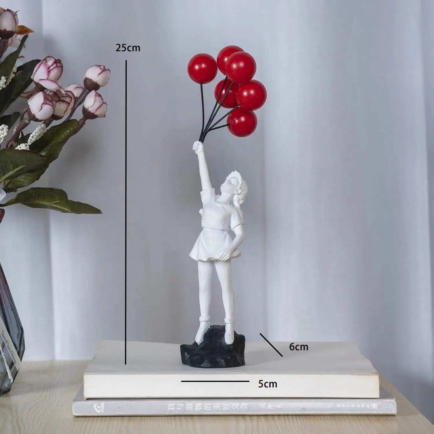 BowLift | Banksy flying Balloon Girl Statue