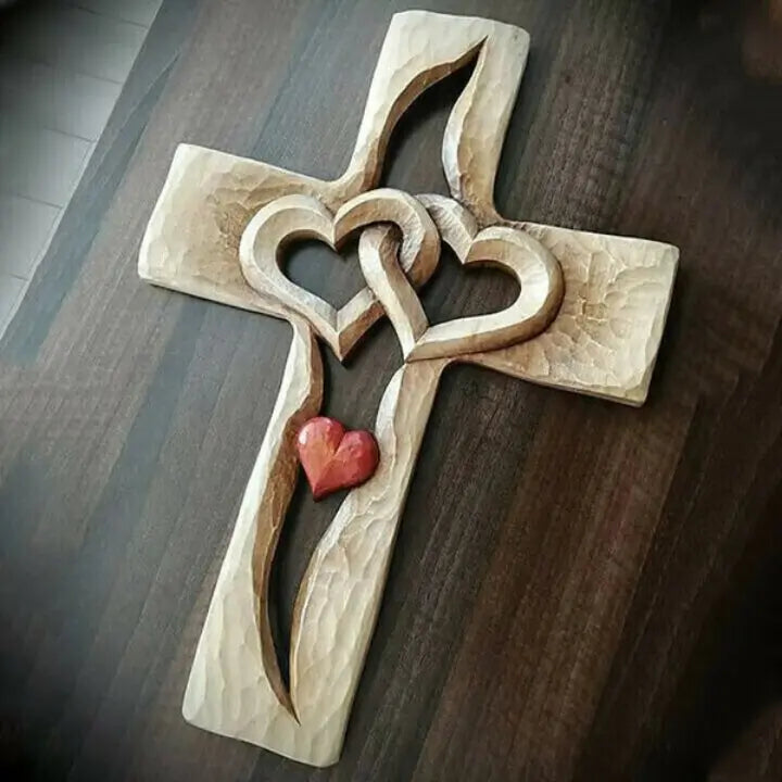 BowLift | Hand-carved wooden cross with intertwined hearts