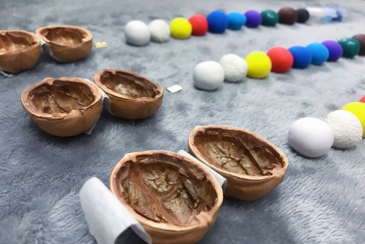 BowLift | Handcrafted dollhouse made from walnut shells with interior light