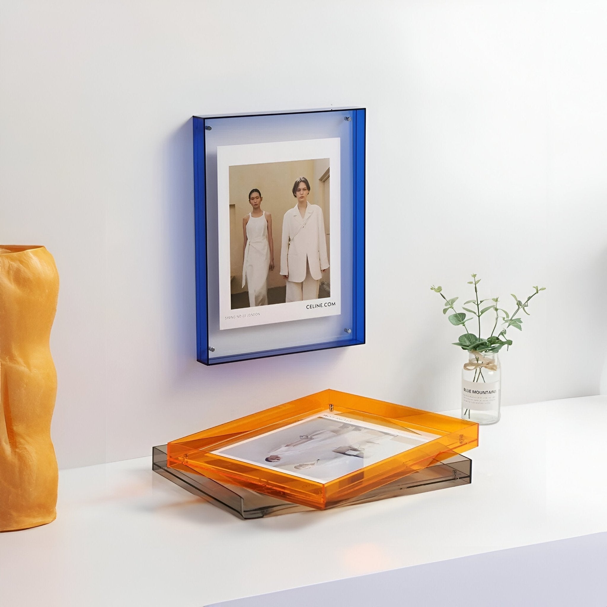 BowLift | Colored transparent acrylic frame for modern displays