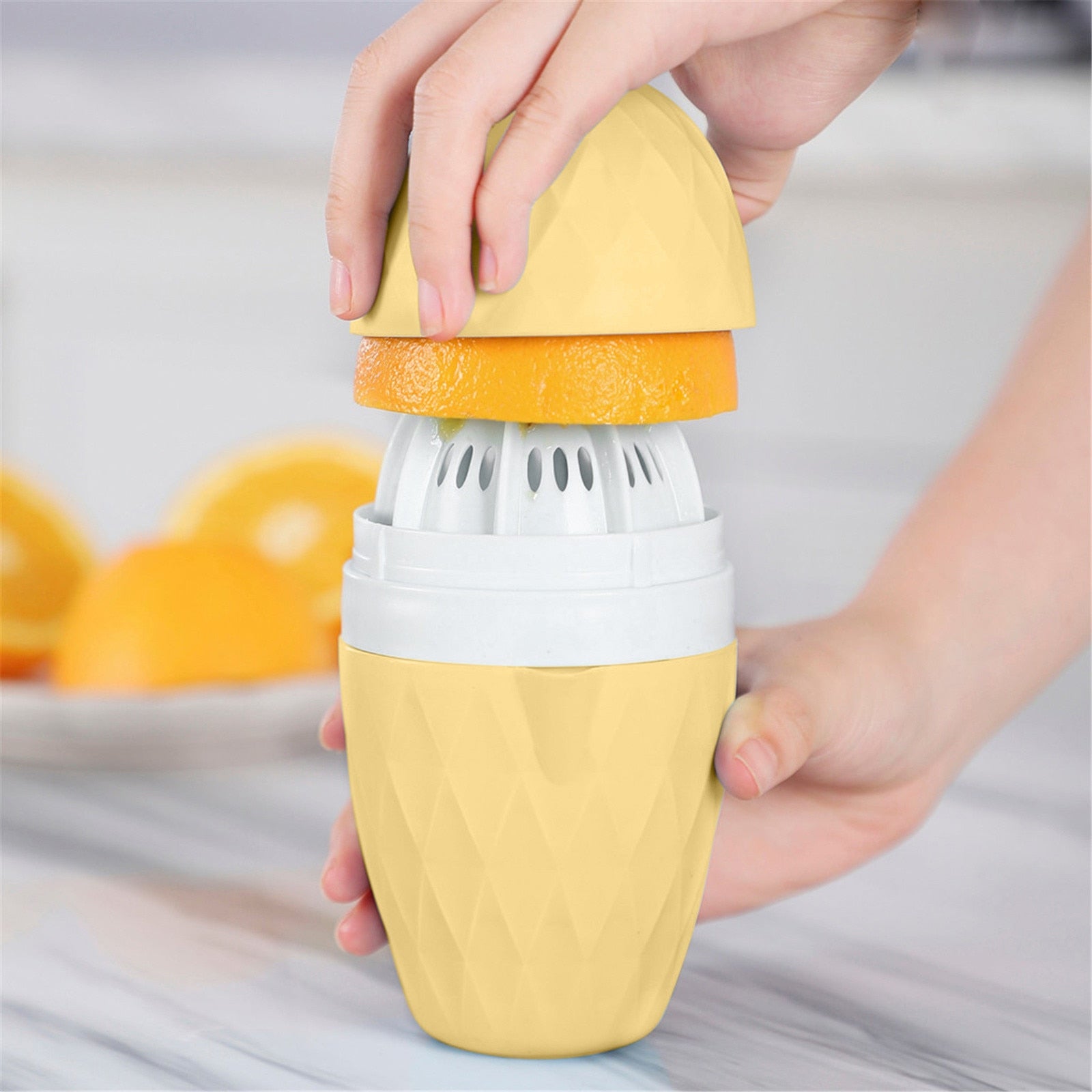 BowLift | Portable Mini Orange Lemon Press Hand Squeezer