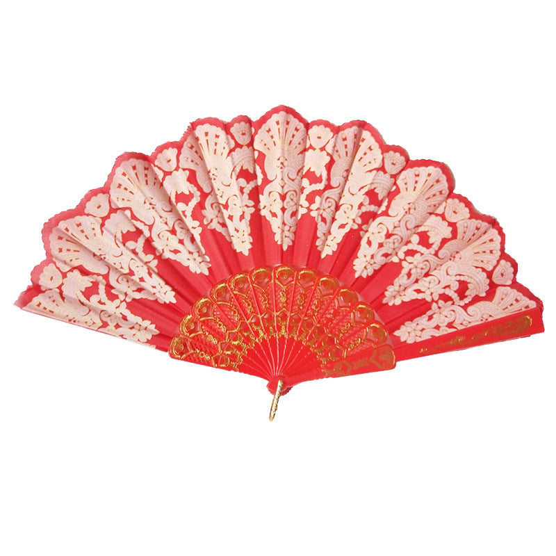 Ladies elegant fan with elaborate decorations Bowlift