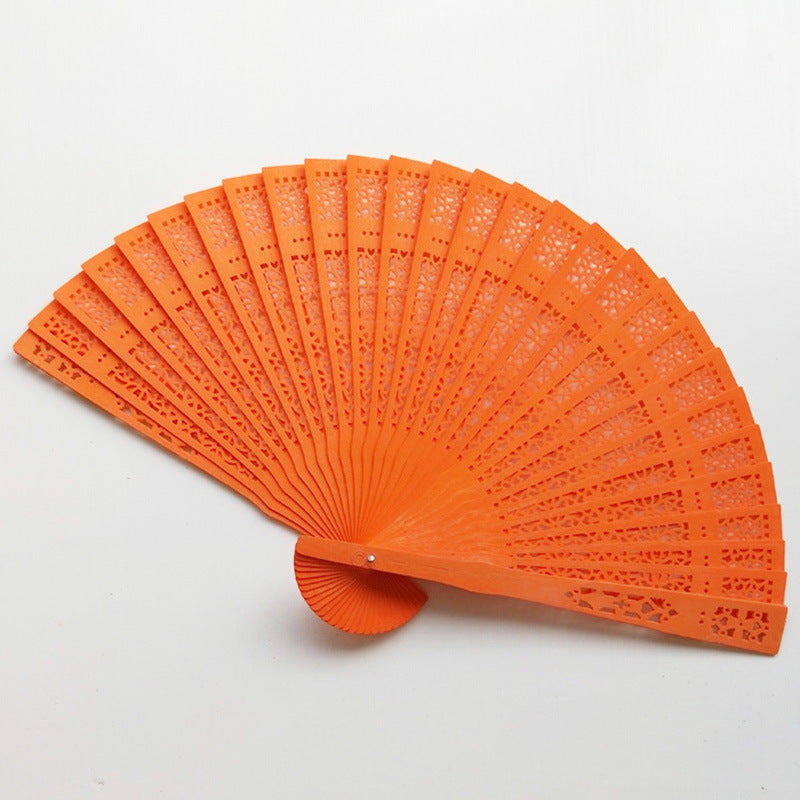 Ladies fan made of delicate plastic with artistic cut pattern Bowlift