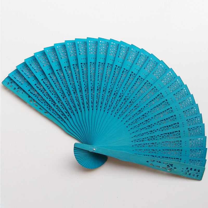 Ladies fan made of delicate plastic with artistic cut pattern Bowlift
