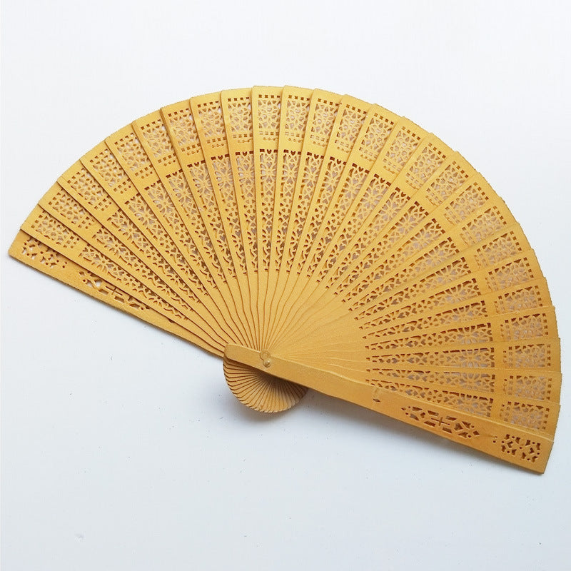 Ladies fan made of delicate plastic with artistic cut pattern Bowlift