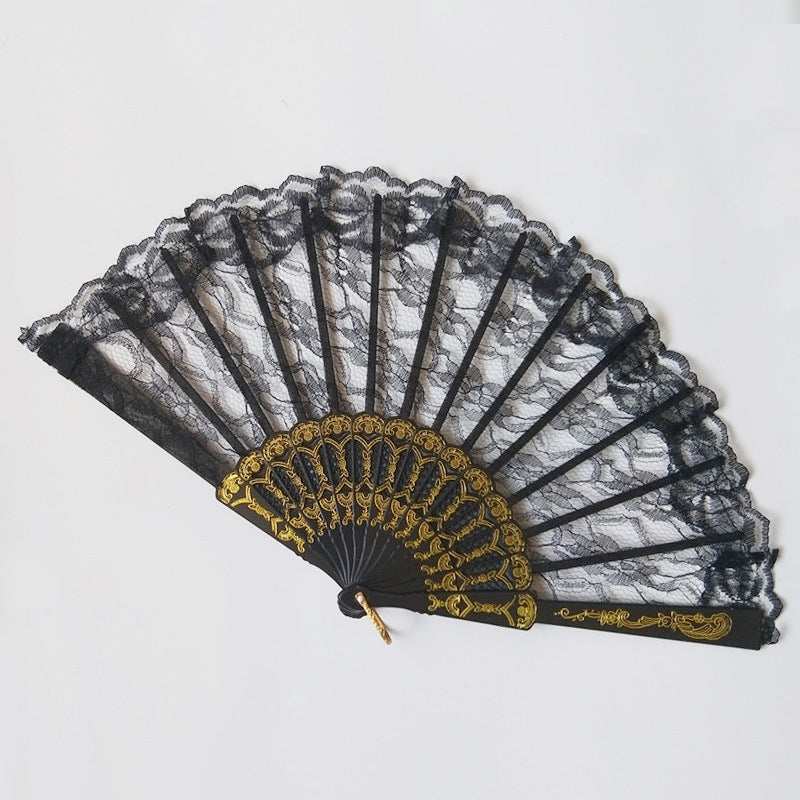 Ladies lace fan with ornate decorations Bowlift