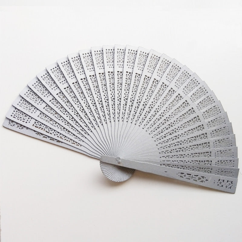 Ladies fan with intricate patterns and elegant laser engraving Bowlift