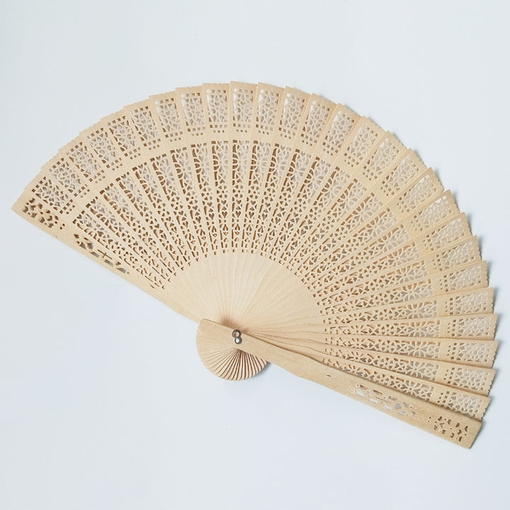 Ladies elegant fan made of high-quality plastic with artistic cutouts Bowlift