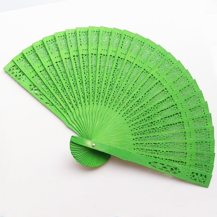 Ladies fan made of delicate plastic with artistic cut pattern Bowlift