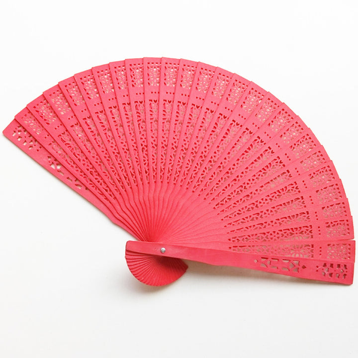 Women's fan made of elegant, intricately perforated material Bowlift