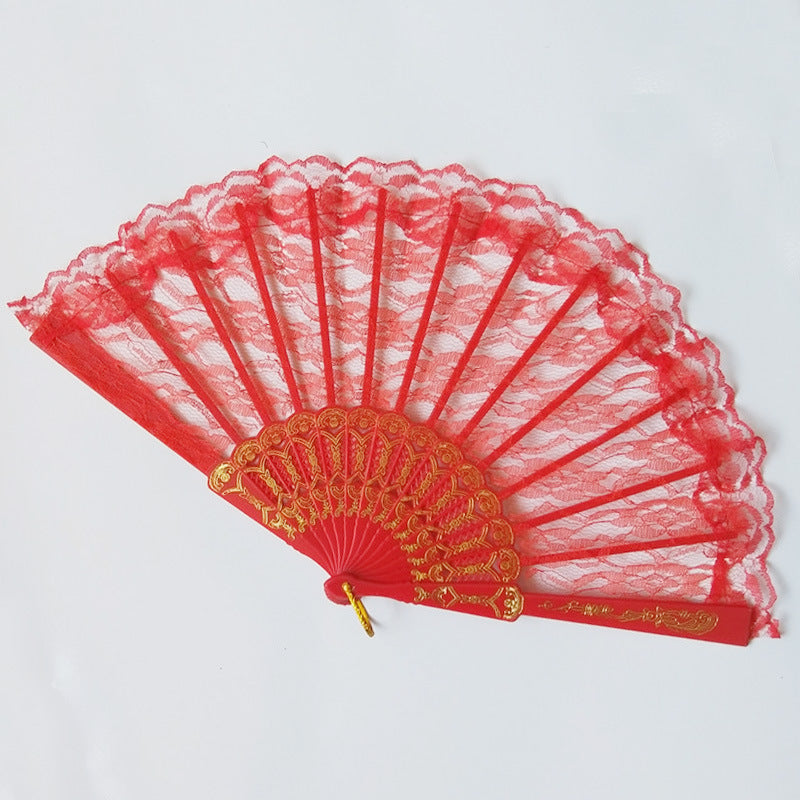 Ladies lace fan with ornate decorations Bowlift