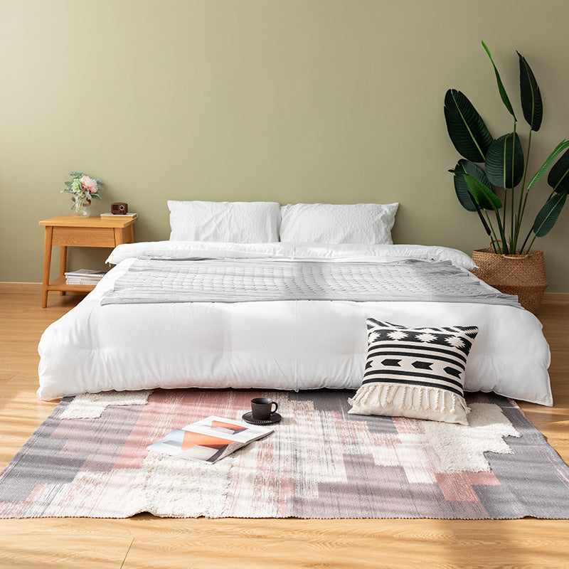 Modern structured living rug with partial shag application and abstract stripe pattern