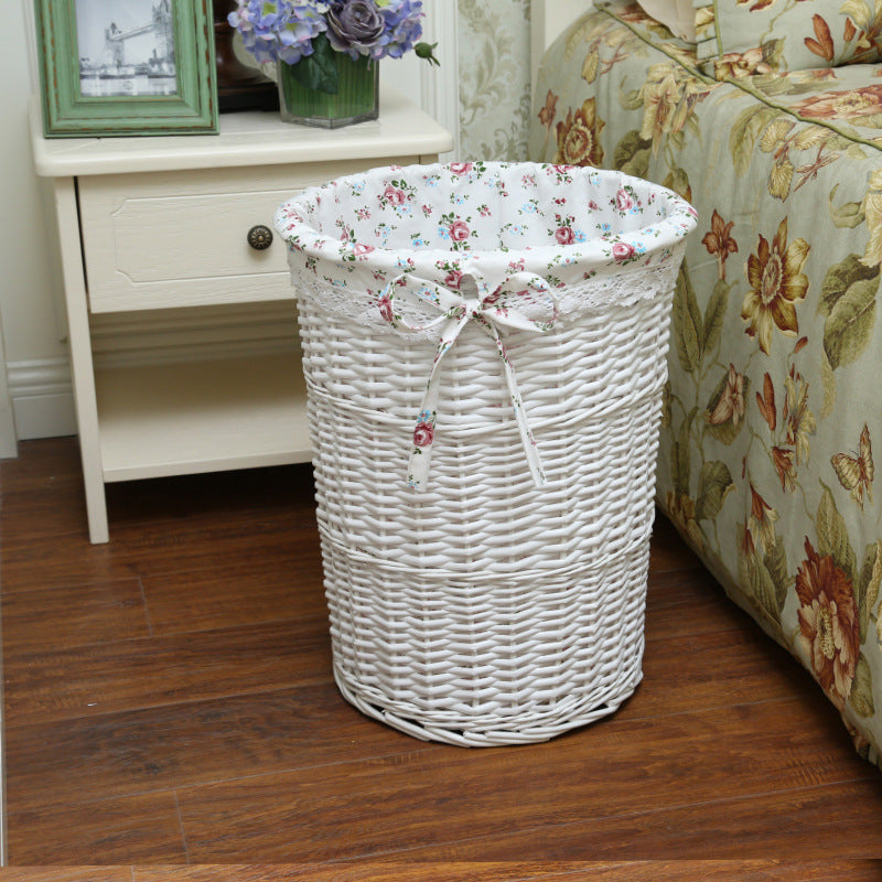 Women's laundry basket with decorative fabric lining and practical carrying handle Bowlift