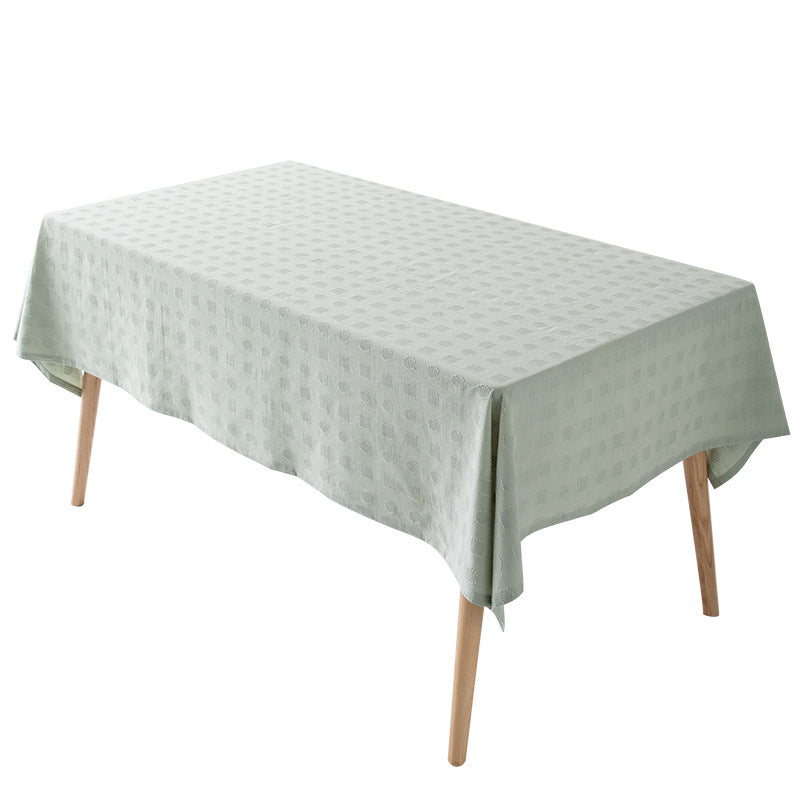 Tablecloth made of cotton blend with embossed square and circle relief Bowlift