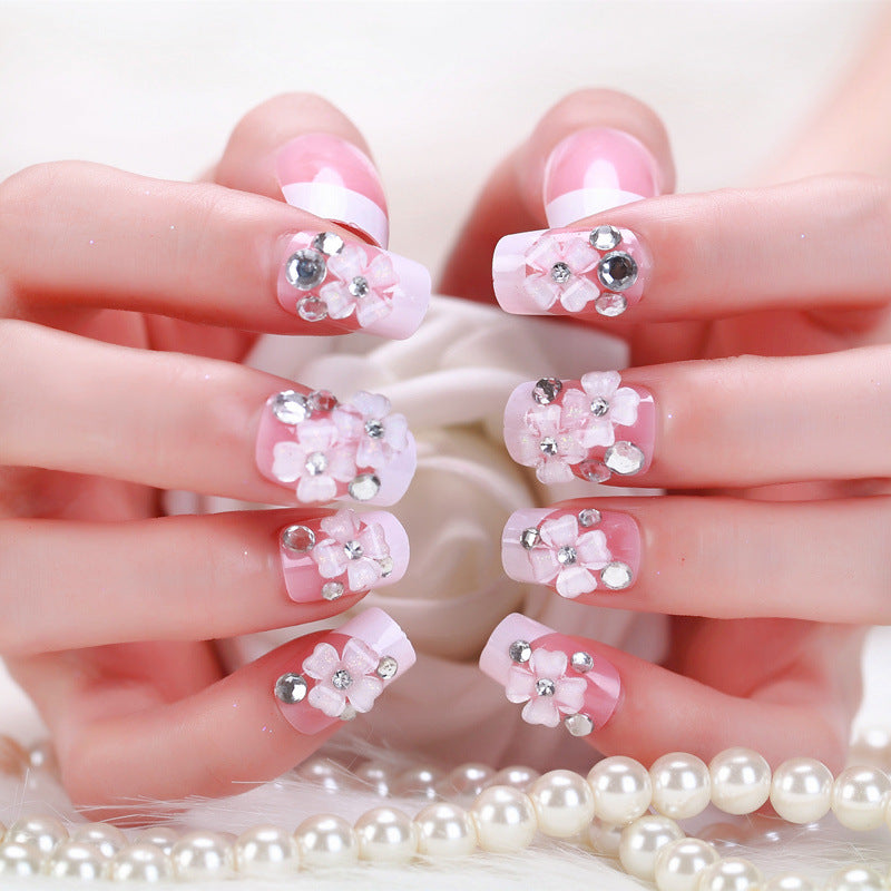 Artificial nails with delicate floral decorations Bowlift