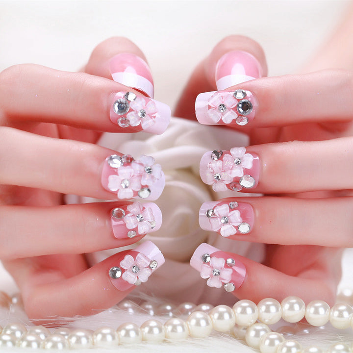 Artificial nails with delicate floral decorations Bowlift
