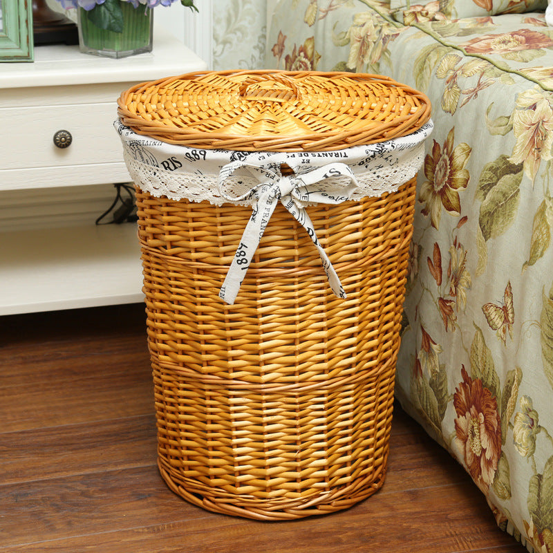 Women's laundry basket with decorative fabric lining and practical carrying handle Bowlift