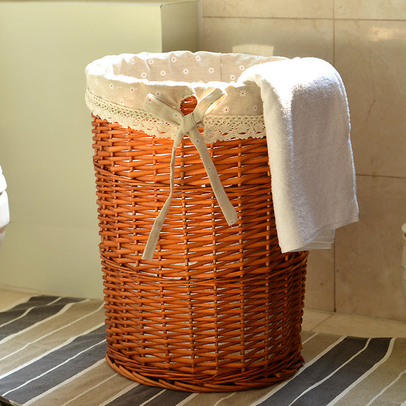 Women's laundry basket with decorative fabric lining and practical carrying handle Bowlift