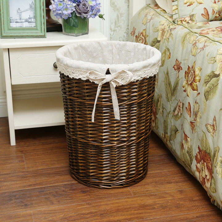 Women's laundry basket with decorative fabric lining and practical carrying handle Bowlift