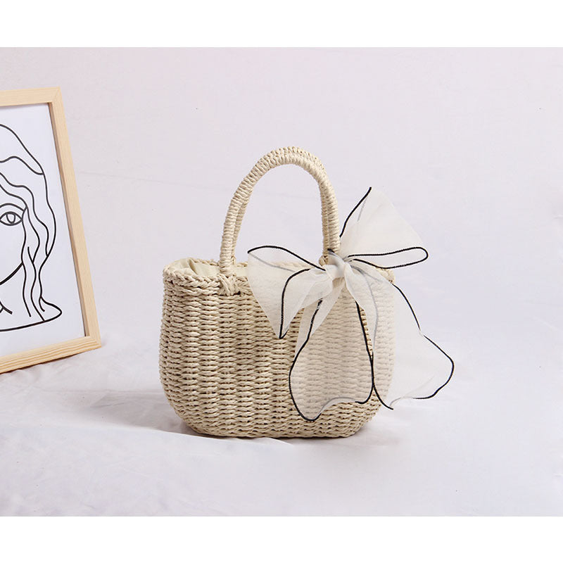 Handcrafted rattan bag with refined details Bowlift