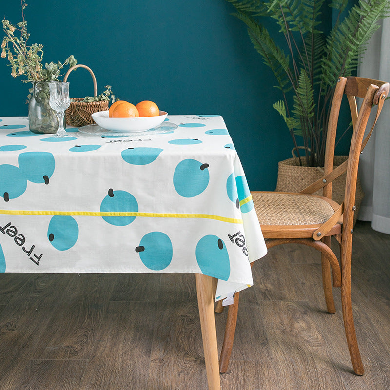 Rectangular cotton blend tablecloth with fruity orange print and easy-care finish Bowlift