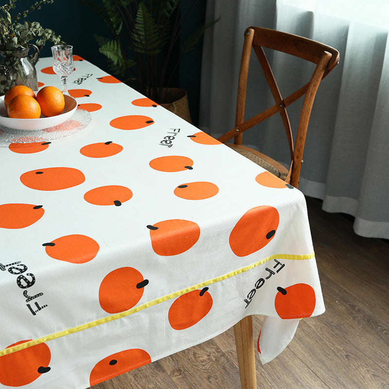 Rectangular cotton blend tablecloth with fruity orange print and easy-care finish Bowlift