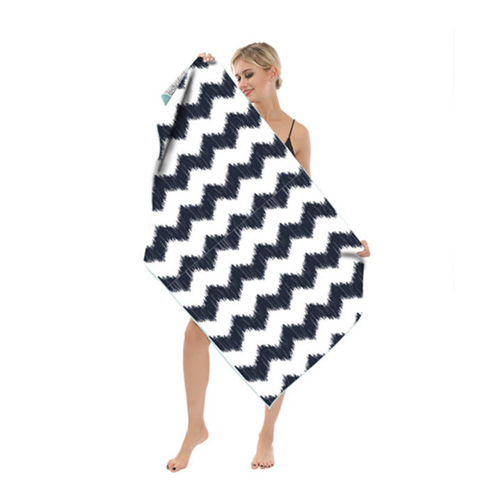 Beach towel with modern leaf and geometric design Bowlift