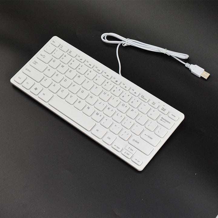 Flat USB keyboard with quiet keystrokes Bowlift