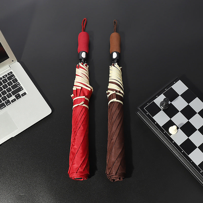 Women's wind-resistant folding umbrella with ergonomic handle Bowlift