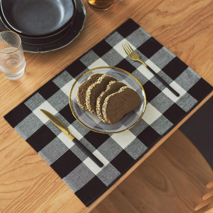 Striped table runner in buffalo check made of durable cotton blend