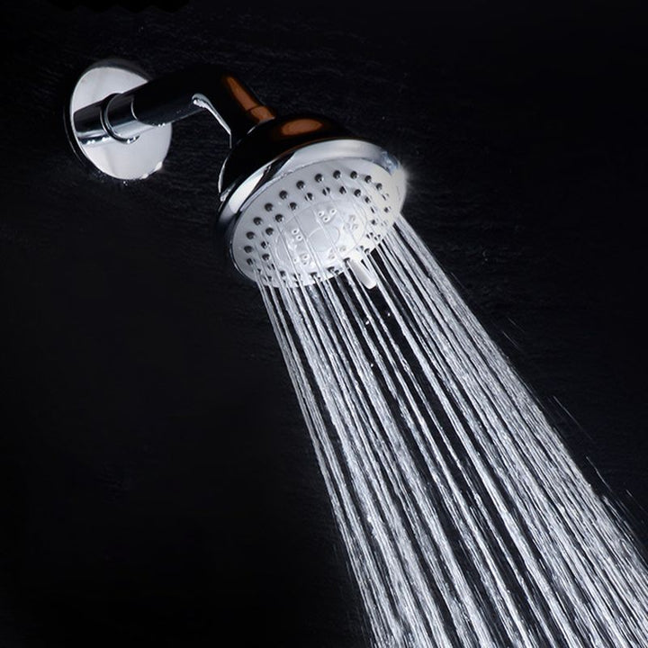 BowLift | Round shower head made of stainless steel in silver wall-mounted shower head