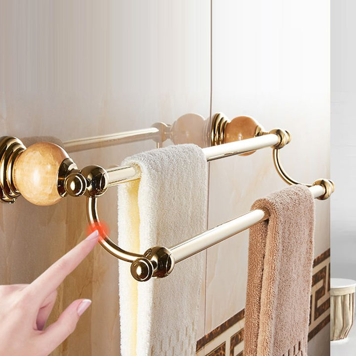 BowLift | Modern bathroom accessories as a single piece or as a set in gold