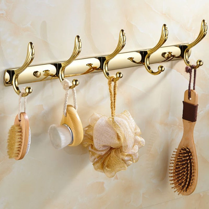 BowLift | Contemporary brushed brass bathroom accessories as a single piece or as a set