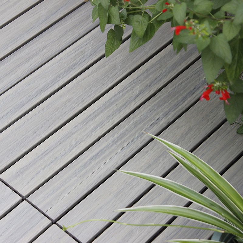 BowLift | Interlocking composite deck tiles Striped pattern patio tiles