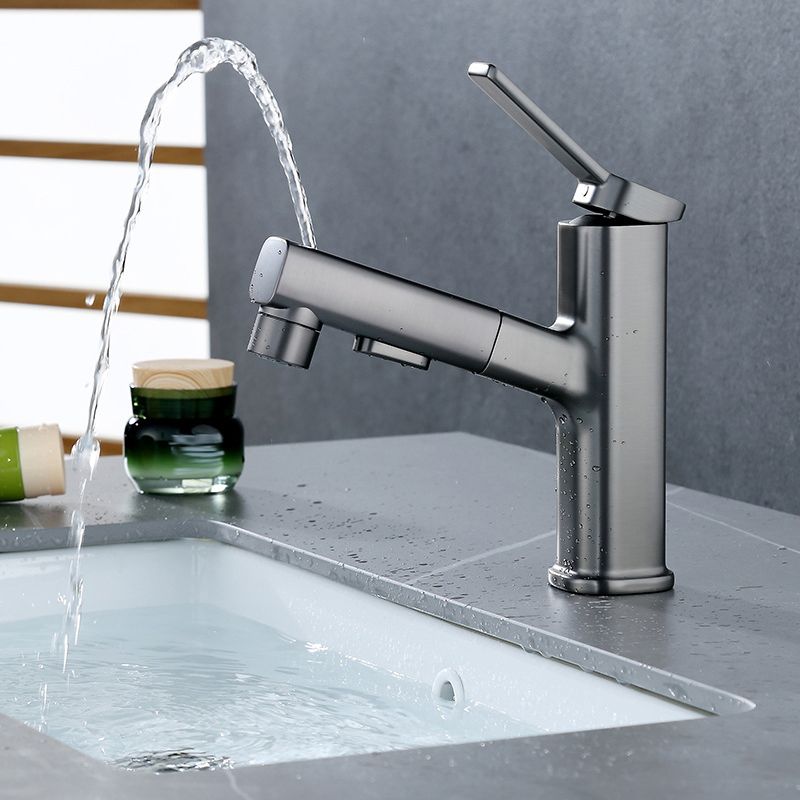 BowLift | Modern bathroom sink faucet with brass lever handles and swivel spout