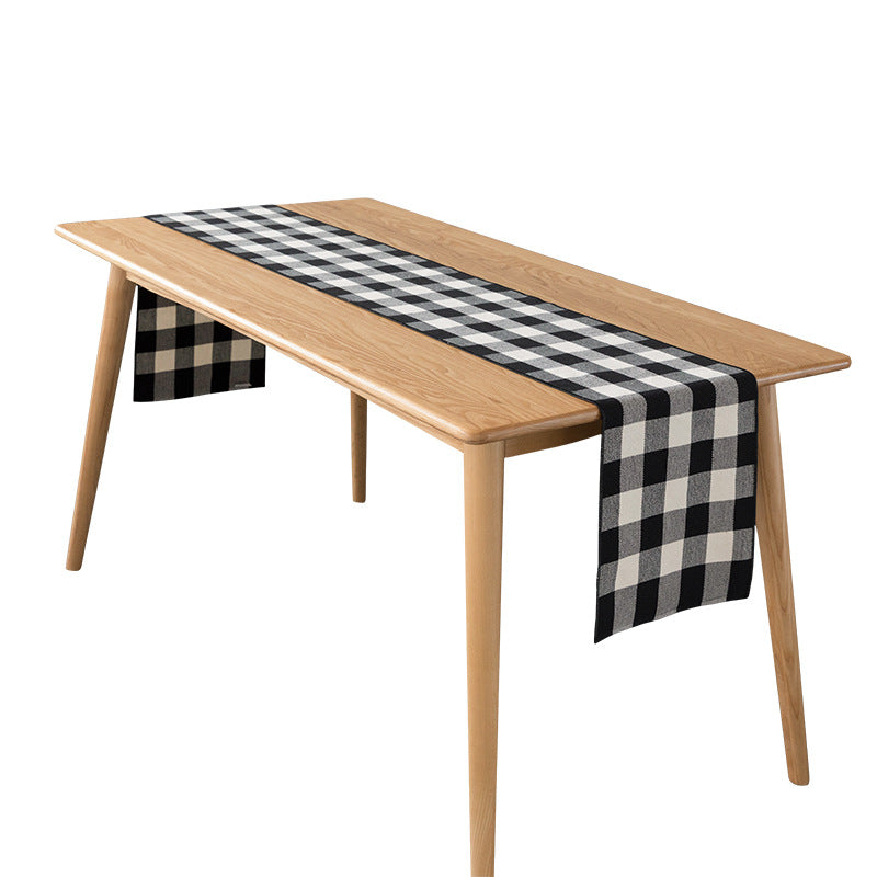 Striped table runner in buffalo check made of durable cotton blend
