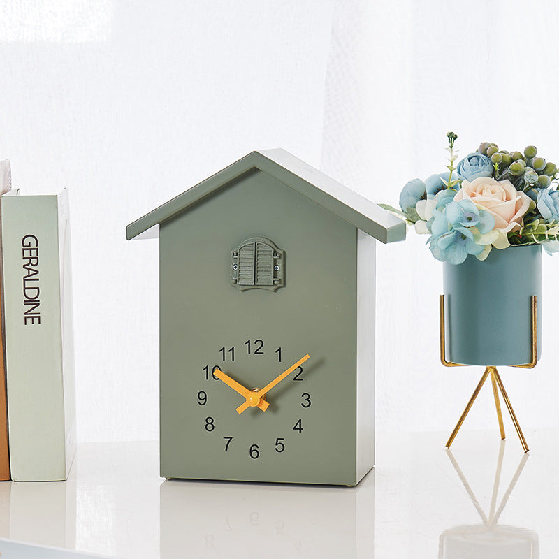 Cuckoo clock in creative house design Bowlift