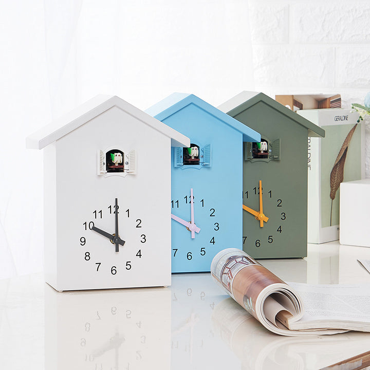 Cuckoo clock in creative house design Bowlift