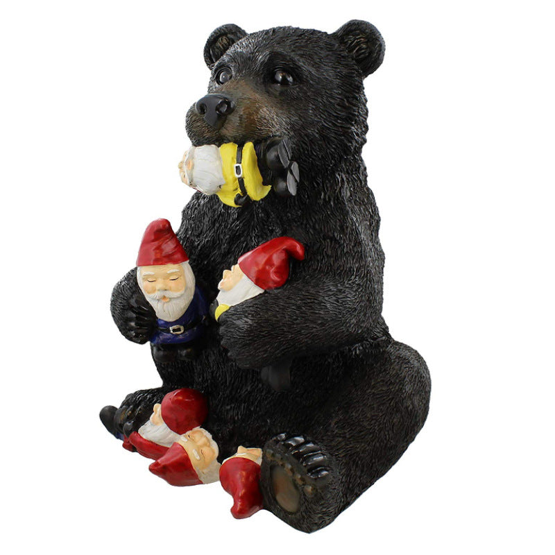 Whimsical Bear Figurine Holding Garden Gnomes