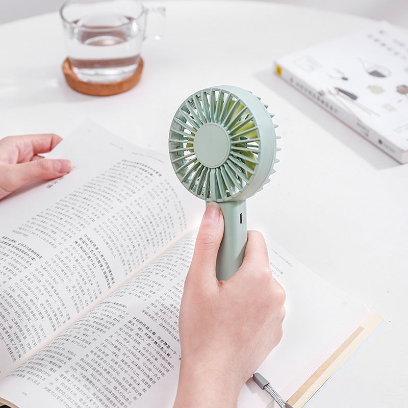 Unisex nan compact portable hand fan with rechargeable battery and USB charging port quiet operation self-standing Bowlift