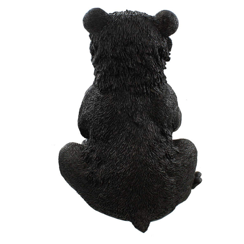 Whimsical Bear Figurine Holding Garden Gnomes