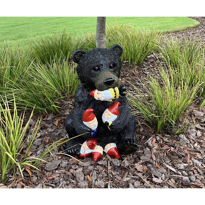 Whimsical Bear Figurine Holding Garden Gnomes
